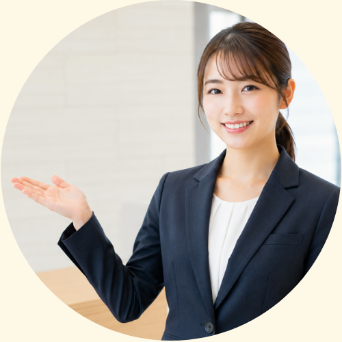 女性社員が案内のポーズ